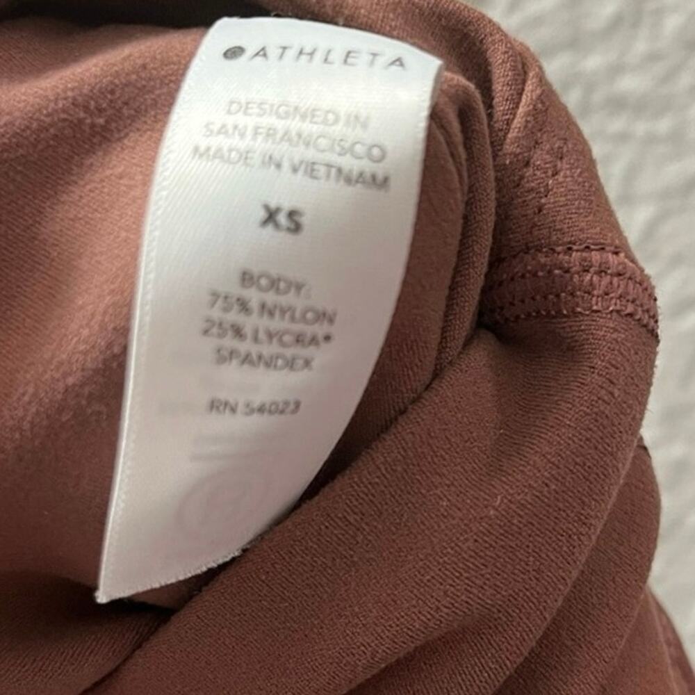 Athleta Elation Pirouette 7/8 Leggings XS Brown Criss Cross Hem High Rise Yoga - Picture 8 of 14